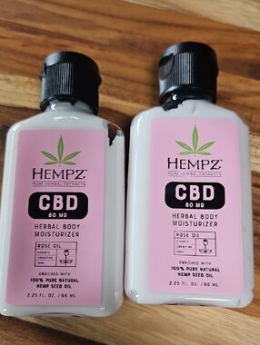2-Hempz Rose Oil Herbal Body Moisturizer 2.25oz Two travel size bottles.